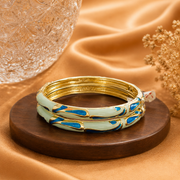 Sculpted Swirl Gold Enamel Bangles