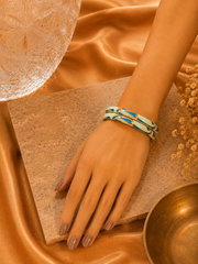 Sculpted Swirl Gold Enamel Bangles