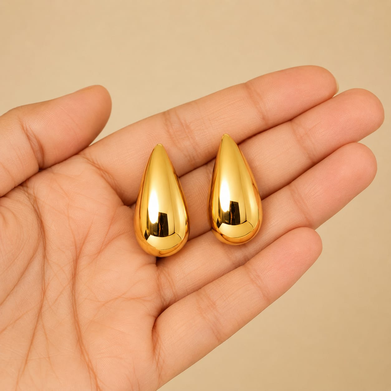 Glossy Gold Teardrop Hoop Earrings